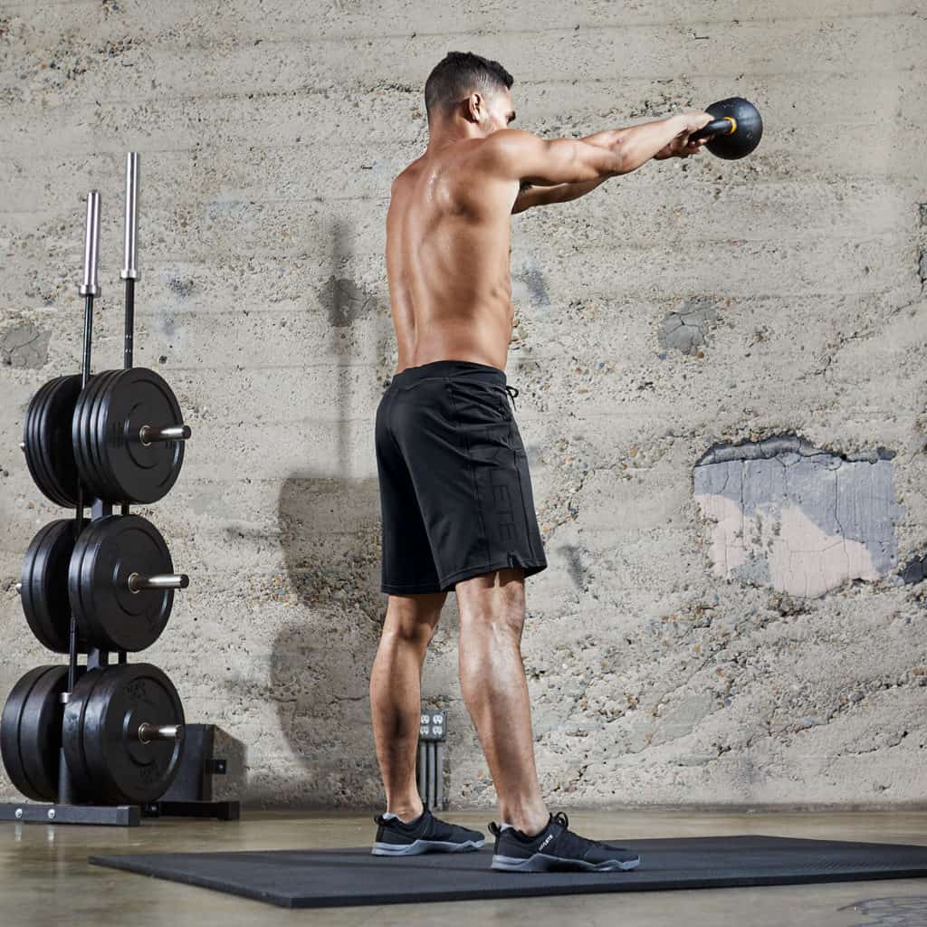 Kettlebell swing with the Hylete Vertex II men's workout shorts for the gym - black