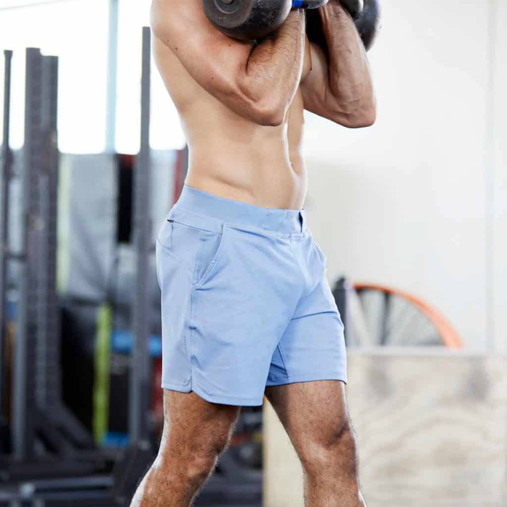 Kettlebell rack with the Hylete Workout Shorts for Men - Fuse Short in Heather Delta/Delta