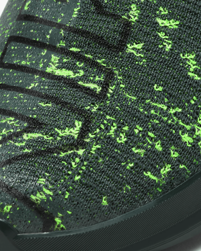 Mesh upper closeup of Nike React Metcon Men's CrossFit Training Shoe in Seaweed/Green Spark/Vintage Green
