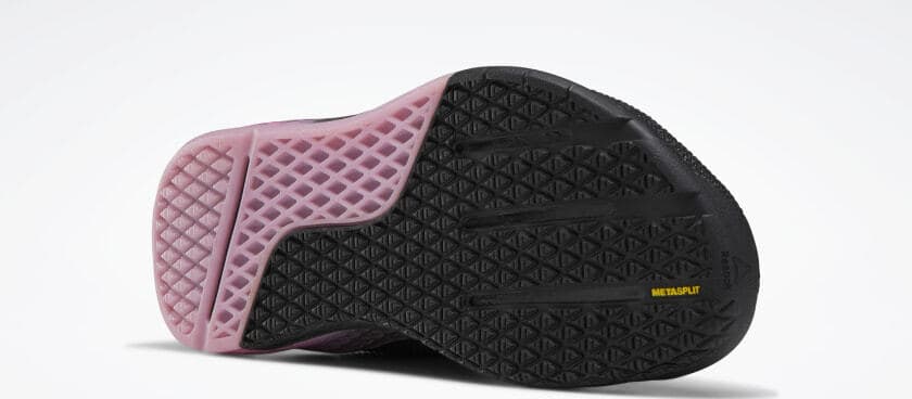 Outsole closeup of the Reebok Nano 9 Men's CrossFit Training Shoe in BLACK / COLD GREY 7 / POSH PINK