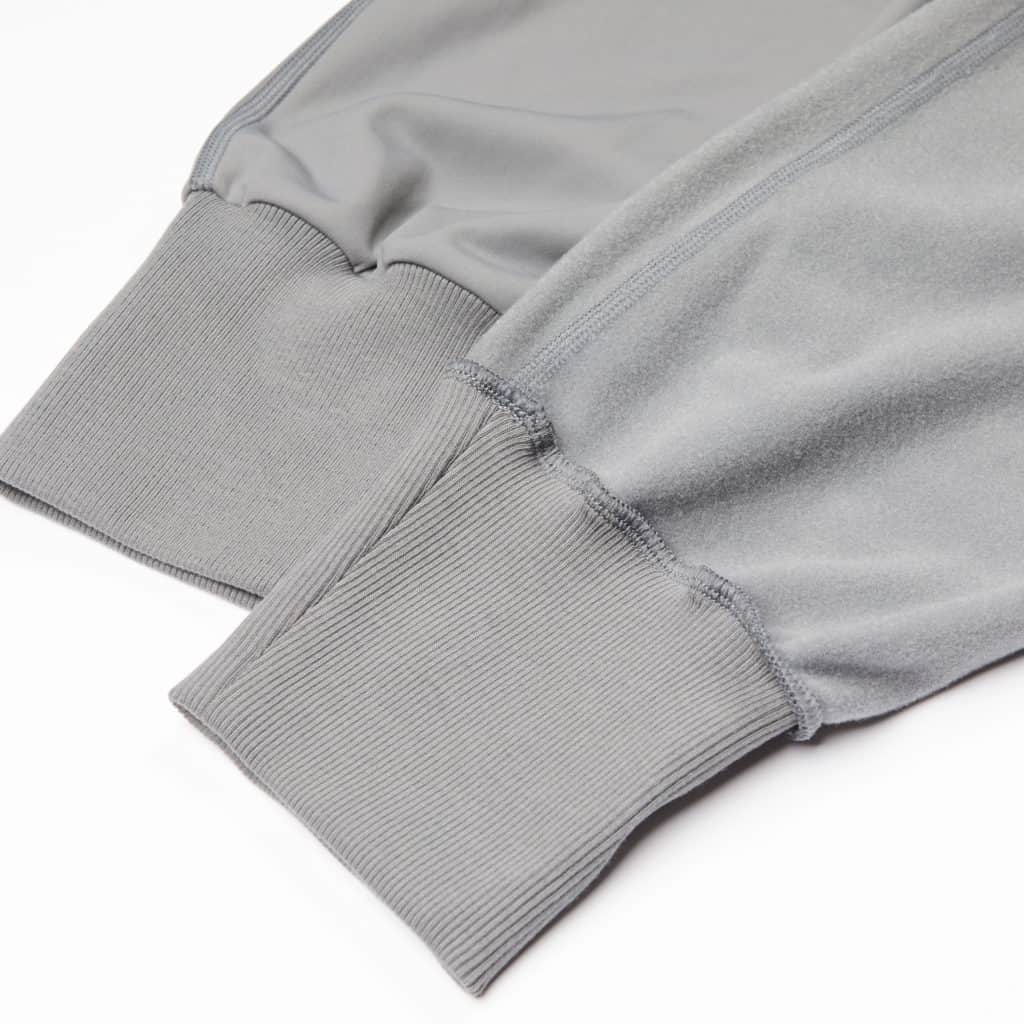 Ribbed cuffs of the Hylete Urban Jogger Workout Sweatpants for Women in Cool Gray