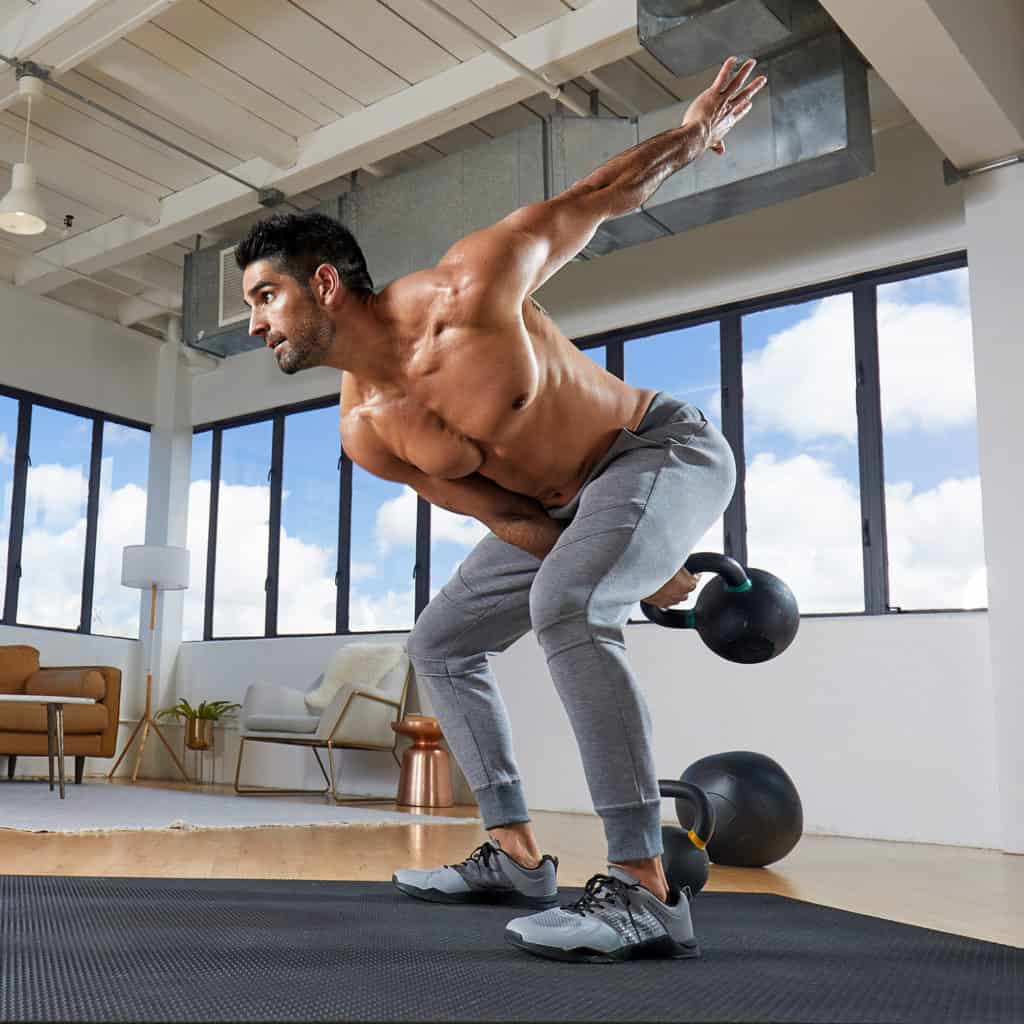 Kettlebell swing with the Plexos Workout Pants for CrossFit in Heather Gun Metal