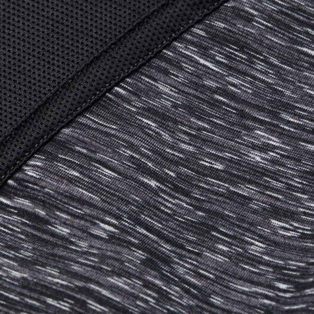 Heathered material closeup of the Nimbus Caprites in Heather Black/Black