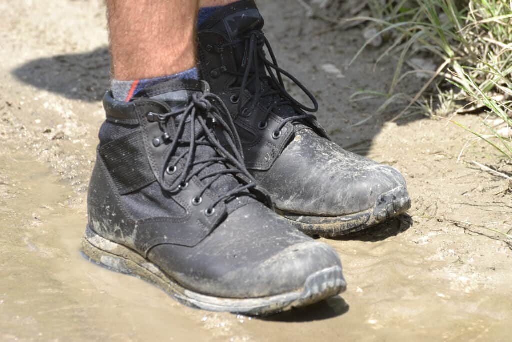 MACV-1 Black Jungle Rucking Boot on a muddy trail