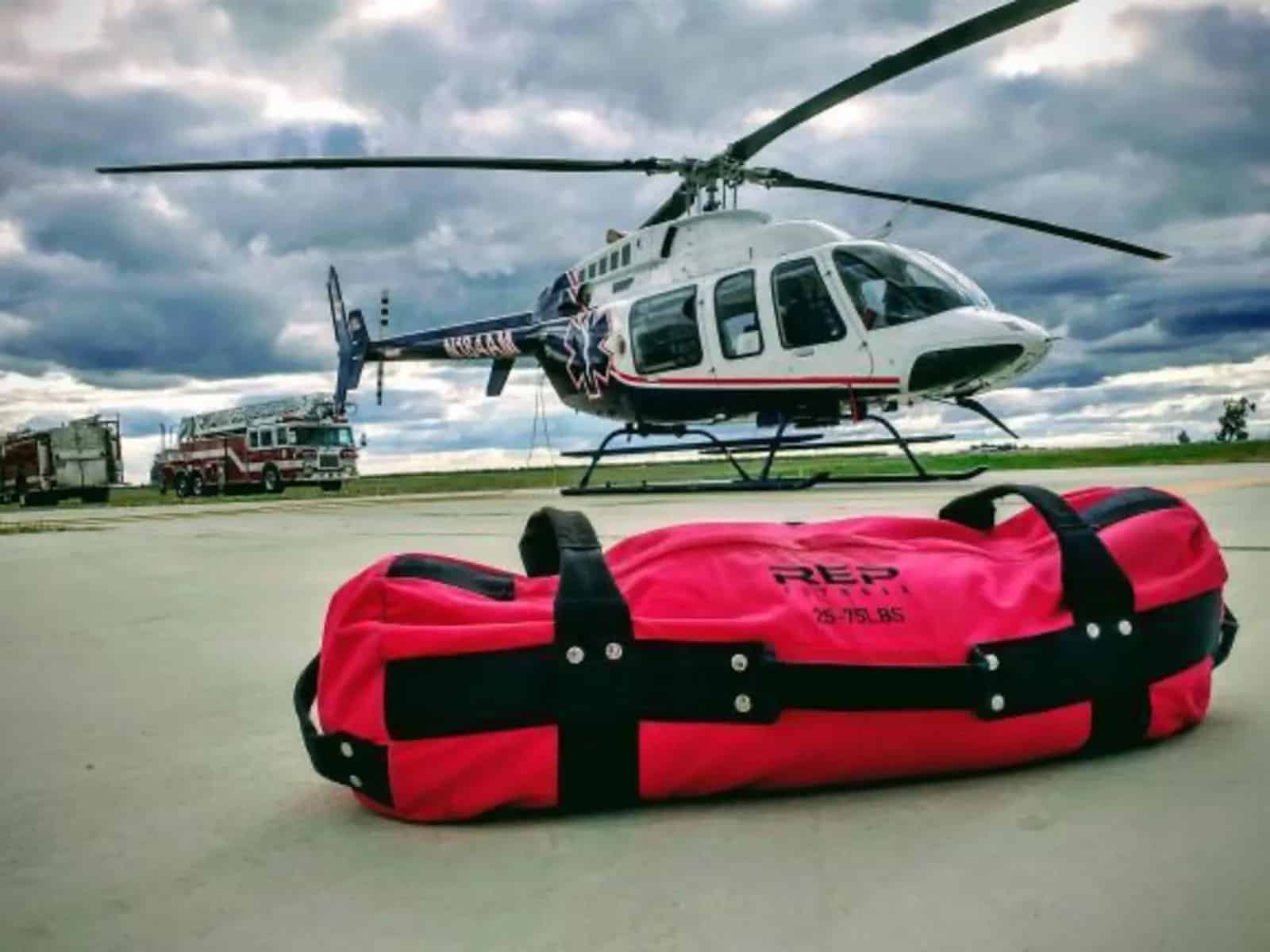 Rep Fitness V2 Sandbags pink with helicopter