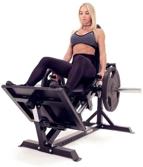 Force USA Compact Leg Press front with a user