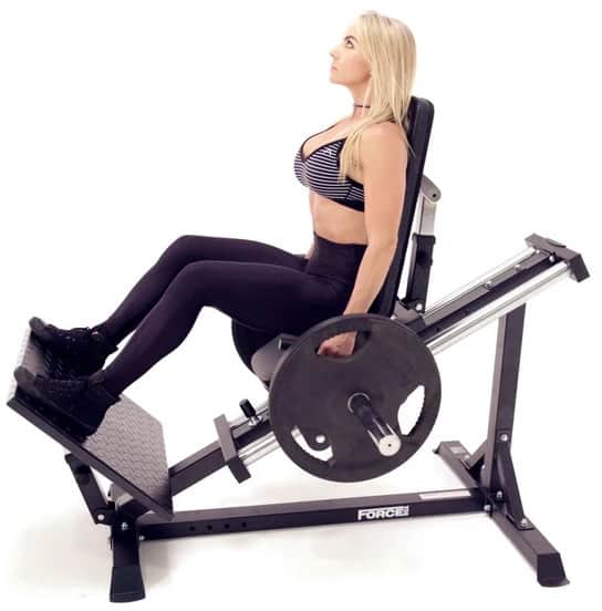 Force USA Compact Leg Press side with a user