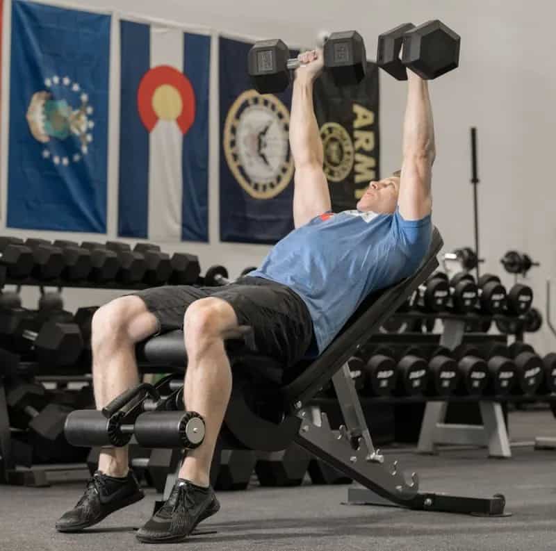 Rep Fitness AB-3000 FID Adjustable Bench with a user