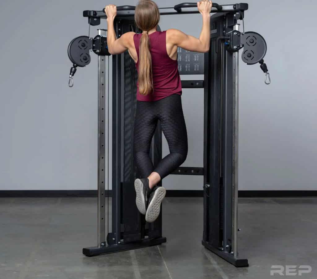 Rep Fitness REP FT-3000 Compact Functional Trainer with a user
