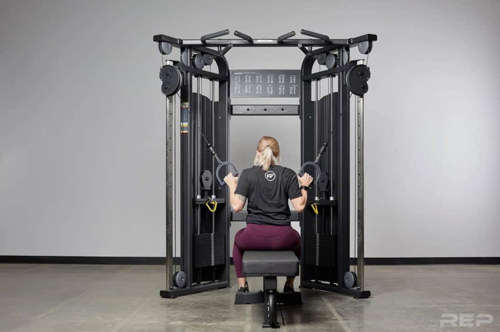 Rep Fitness REP FT-5000 Functional Trainer with a user 1