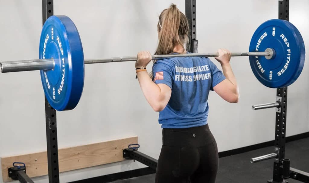 Rep Fitness Rep Color Bumper Plates with a user