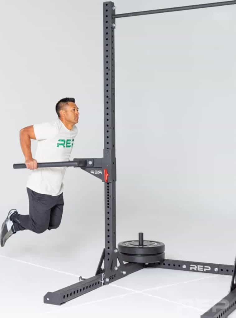 Rep Fitness SR- 4000 Squat Rack with a user 1