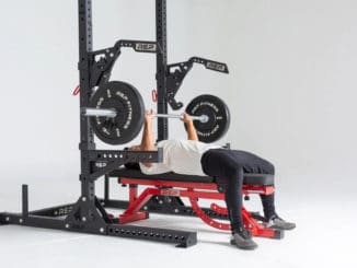 Rep Fitness SR- 4000 Squat Rack with a user 2