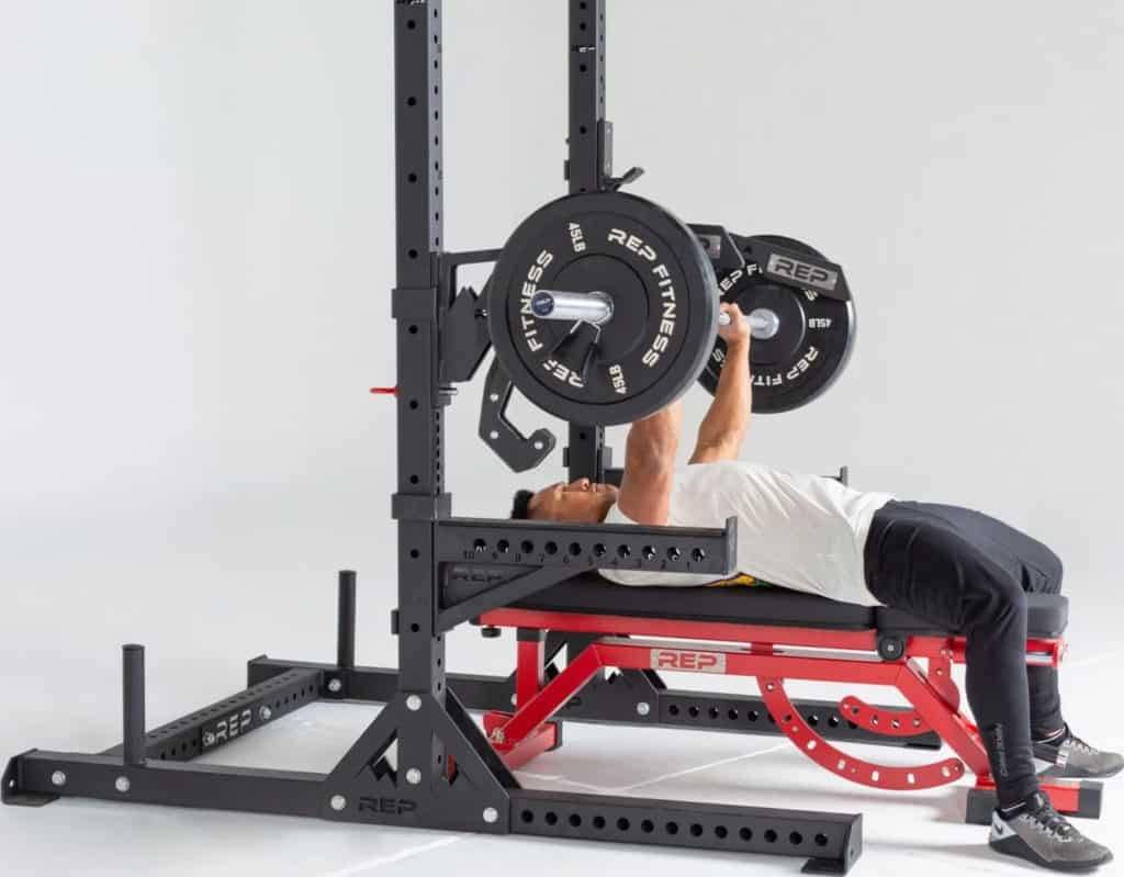 Rep Fitness SR- 4000 Squat Rack with a user 6