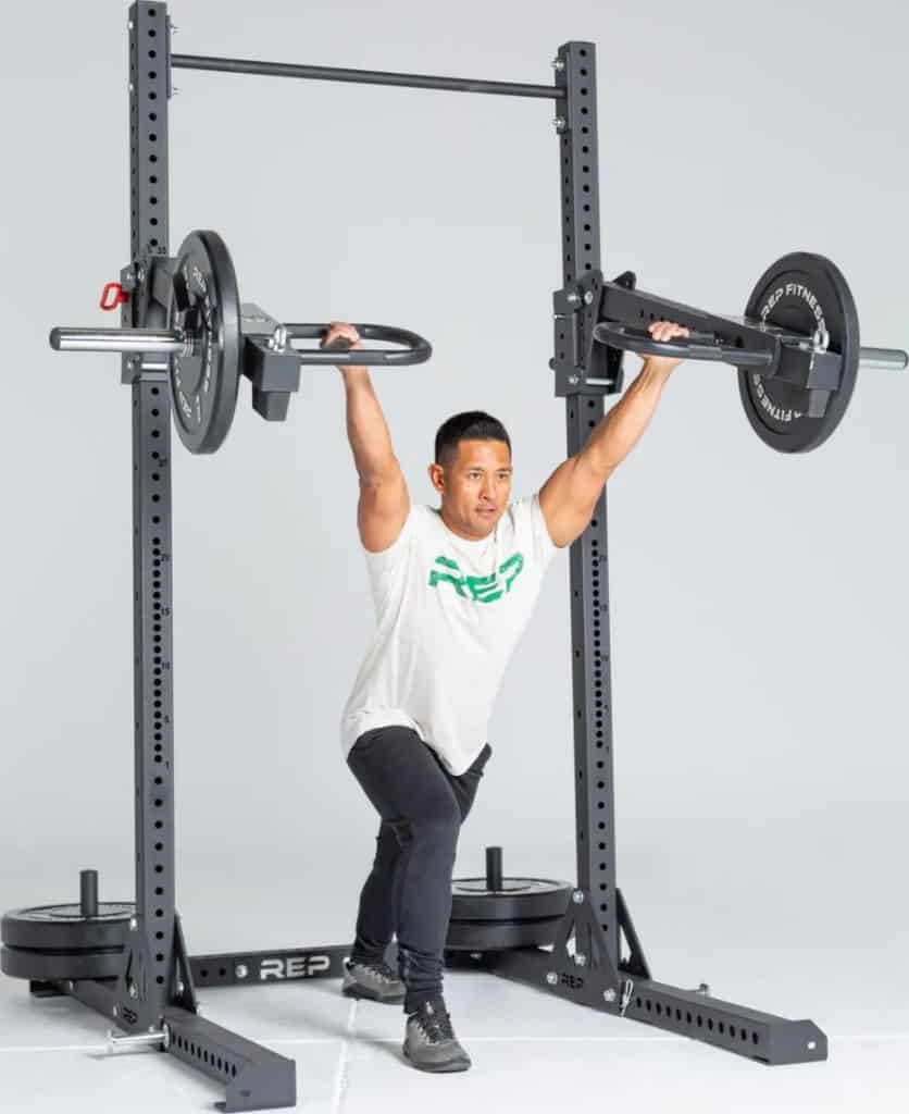 Rep Fitness SR- 4000 Squat Rack with a user