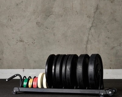 American Barbell Horizontal Rolling Bumper Storage with plates