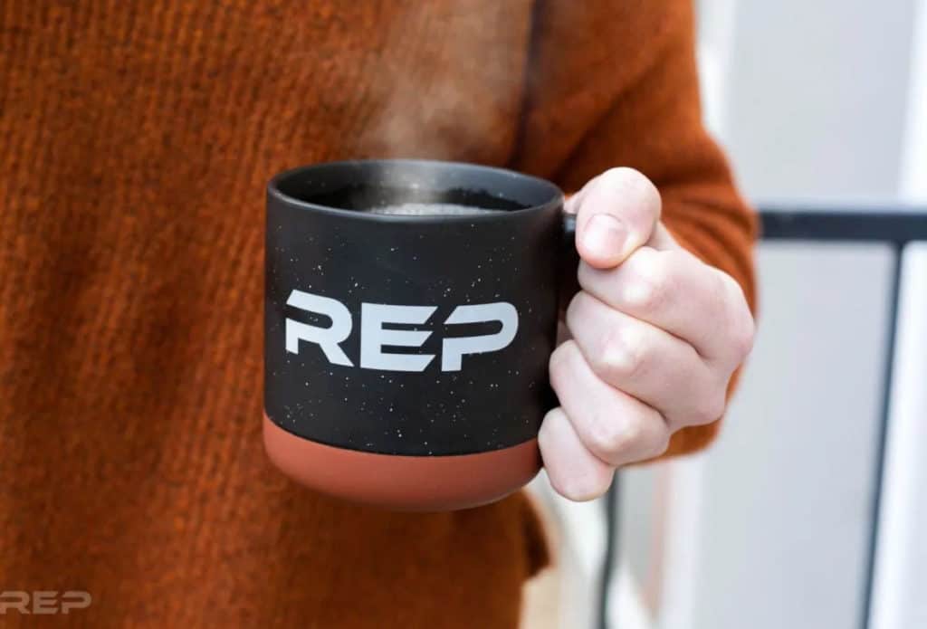 Rep Fitness REP Coffee Mug held