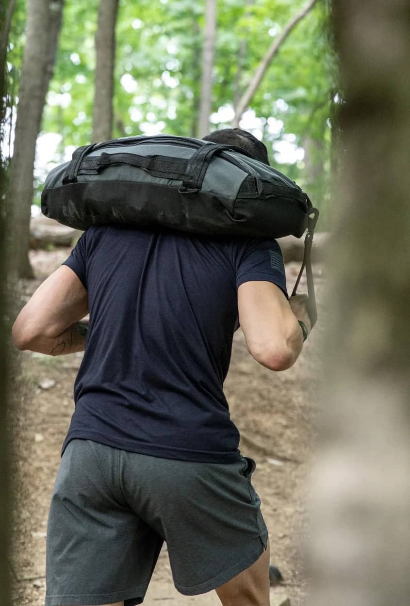 Rogue 3-in-1 Sandbag hiking on shoulders
