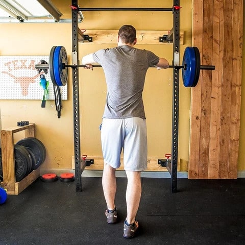 Fringe Sport Retractable Power Rack with a user 1