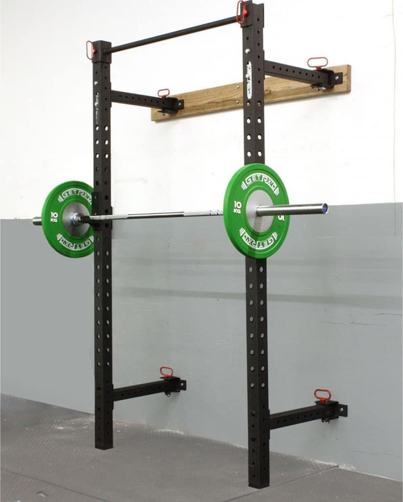 Get RXd Wall Mount Folding Builder Rack with a barbell