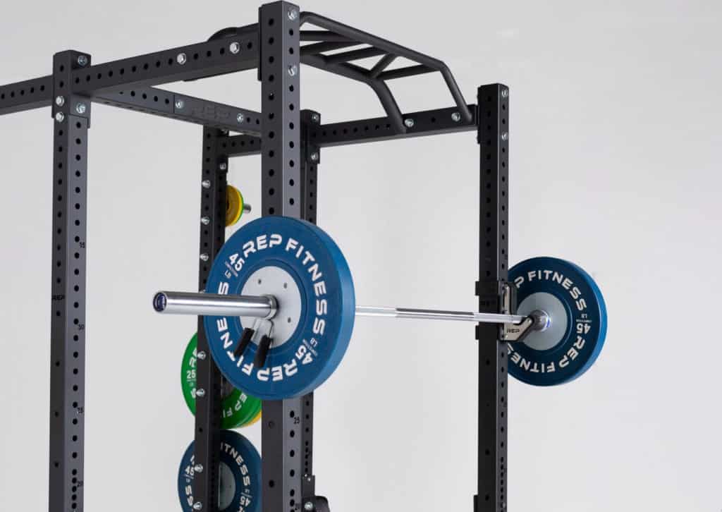 Rep Fitness PR-4000 Build Your Power Rack with a barbell
