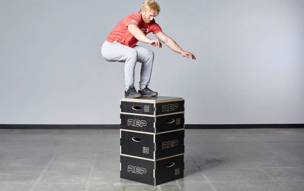 Rep Fitness Stackable Wood Plyos with a user 2