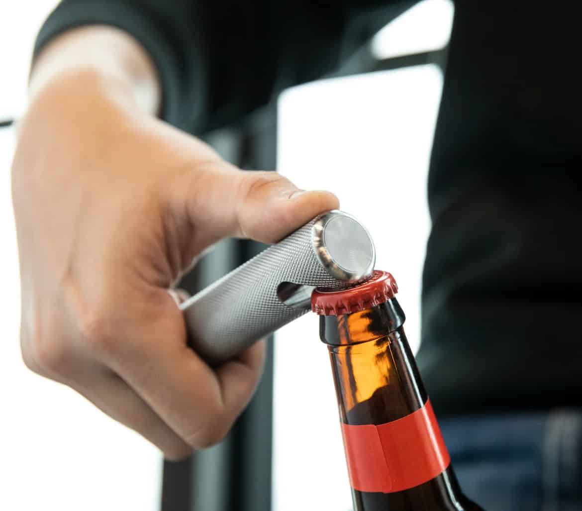 Rogue 25MM Knurled Bottle Opener opening a bottle