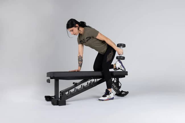 Rep Fitness Rep AB-4100 Adjustable Weight Bench black with an athlete 4