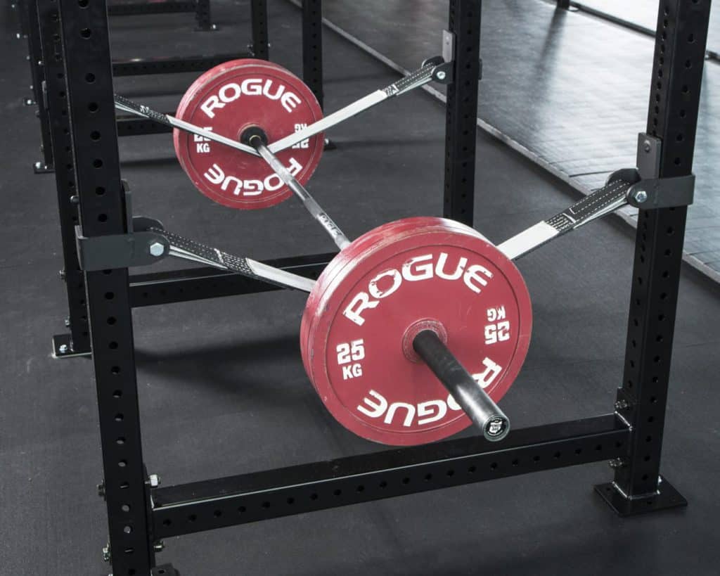 Rogue Monster Lite Strap Safety System 2.0 with a barbell