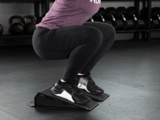 Rogue Squat Wedge with an athlete 2