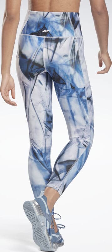 Reebok Lux Bold High-Waisted Liquid Abyss Print Tights worn back