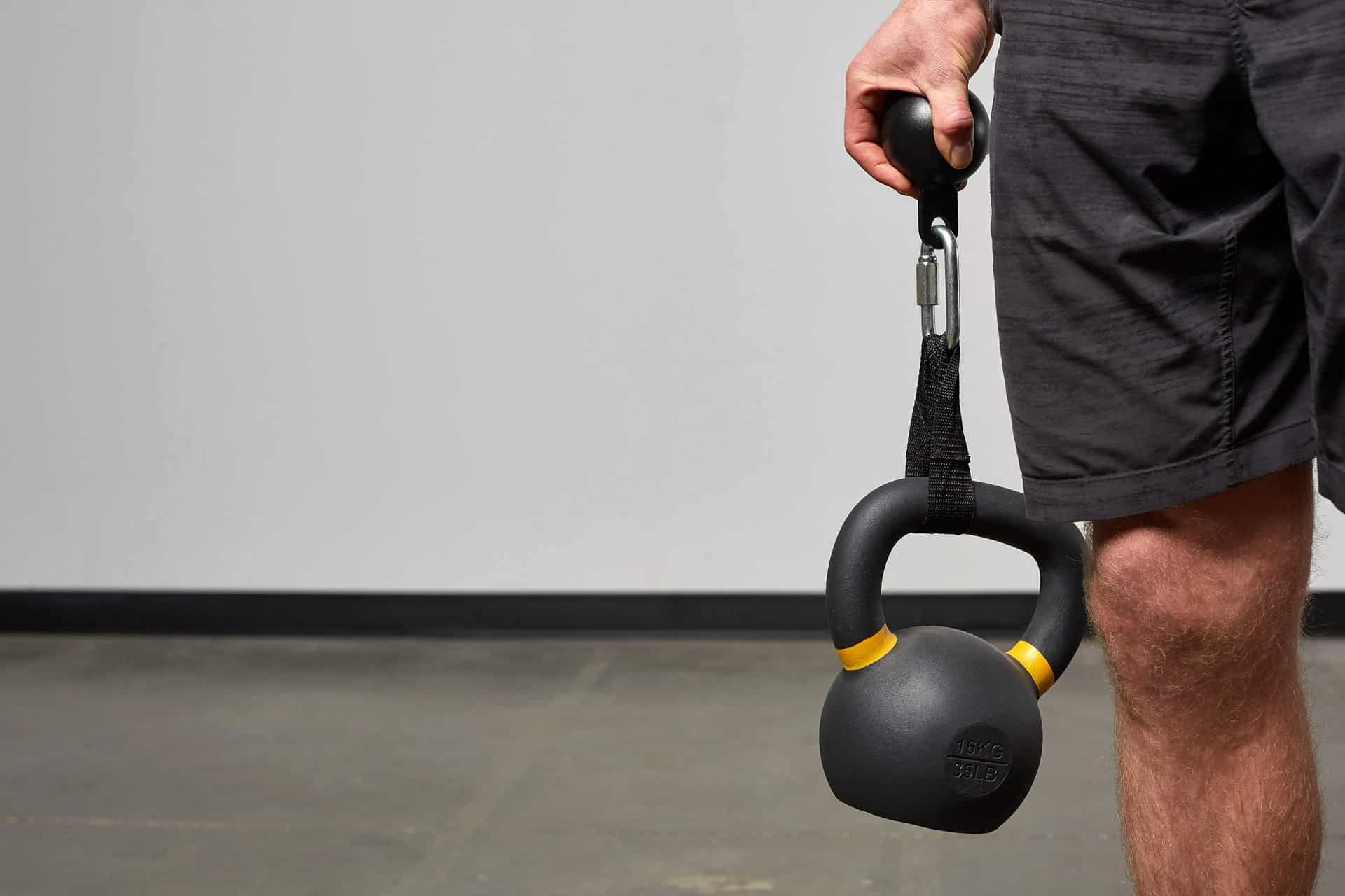 Rep Fitness Cannonball Grips with an athlete 5