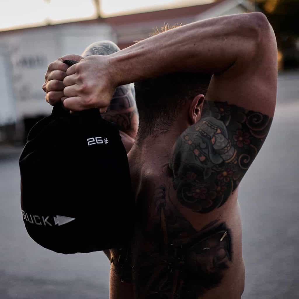 GORUCK Sand Kettlebells 26lbs with an athlete