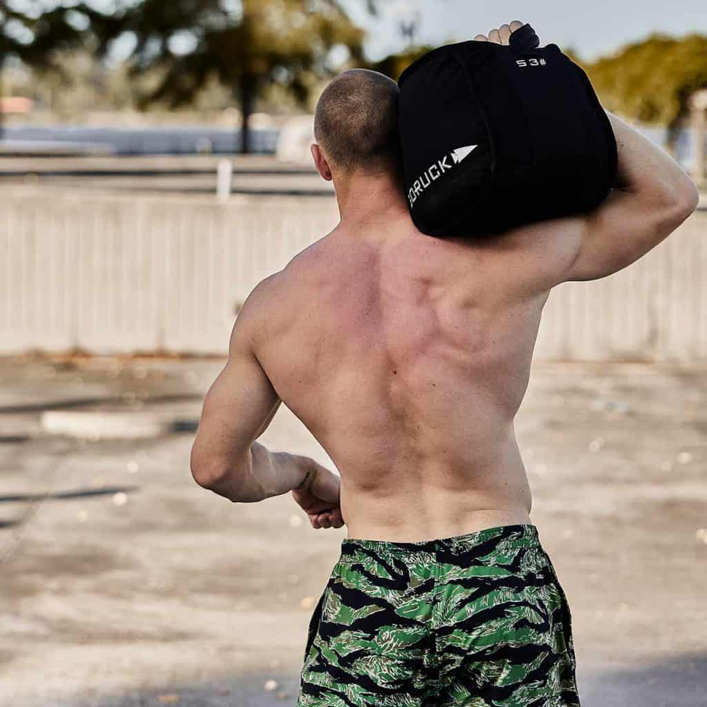 GORUCK Sand Kettlebells 53lbs with an athlete