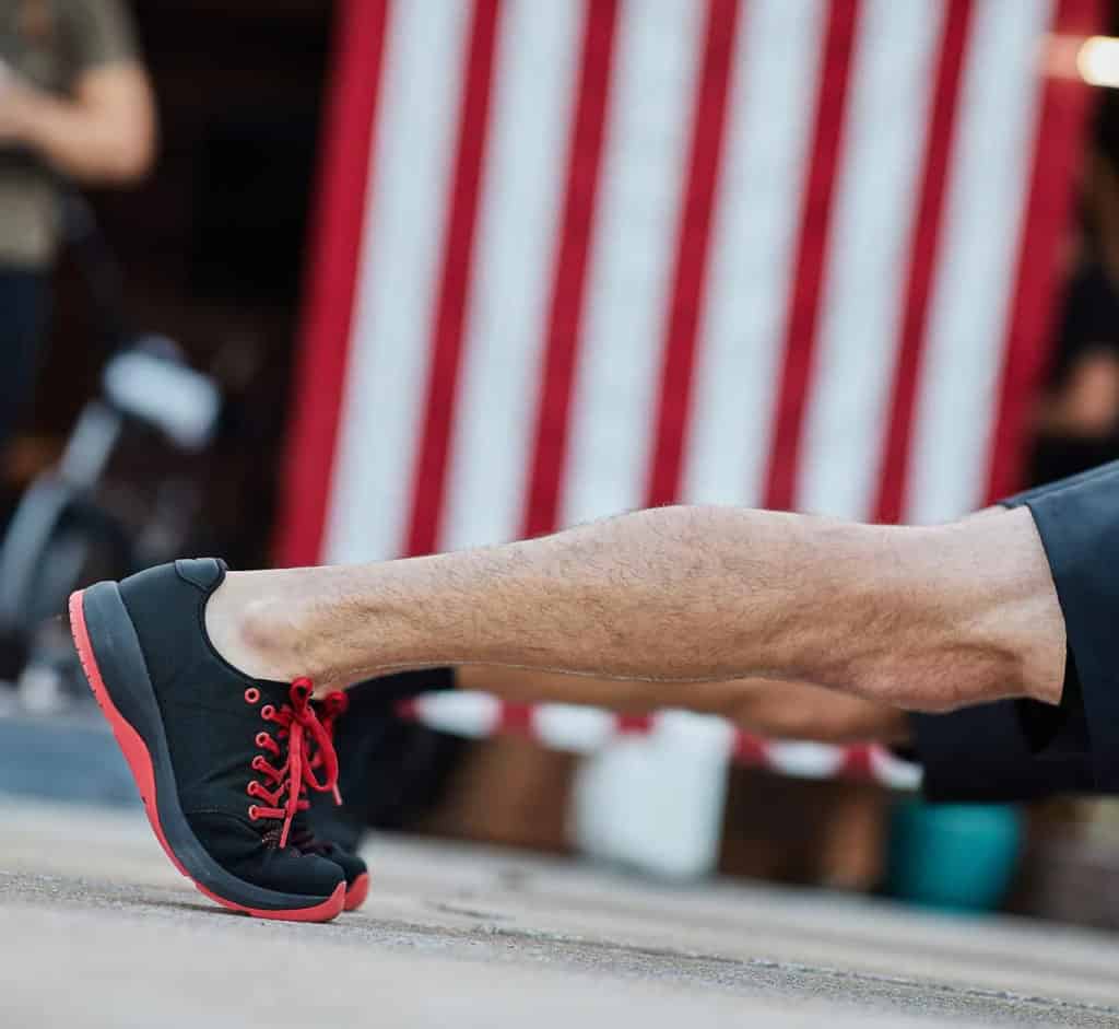 GORUCK Ballistic Trainer red worn by an athlete