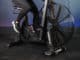 Torque Fitness Stealth Air Bike with an athlete