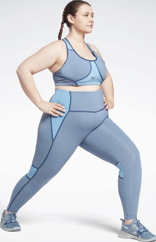 Reebok Lux High-Waisted Colorblock Tights (Plus Size) worn lunge