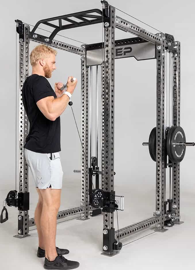 Rep Fitness Athena Plate-Loaded Side-Mount Functional Trainer with an athlete