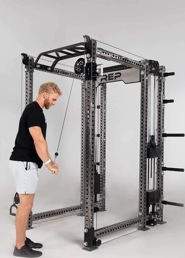 Rep Fitness Athena Selectorized Side-Mount Functional Trainer with an athlete 4