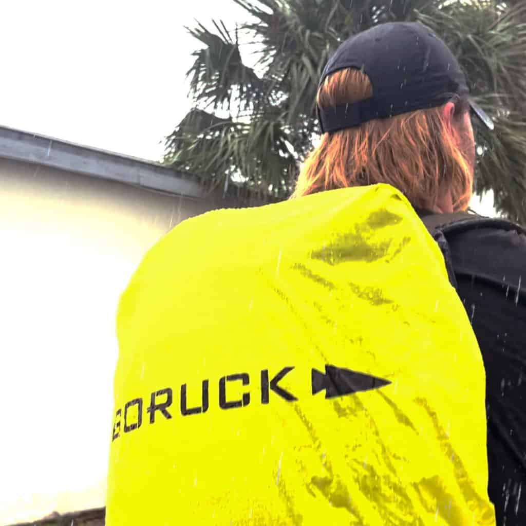 GORUCK Ruck Rain Cover lime worn by an athlete