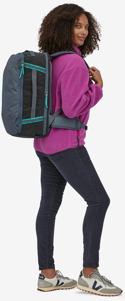 Patagonia Black Hole Mini MLC 26L worn by an athlete 2