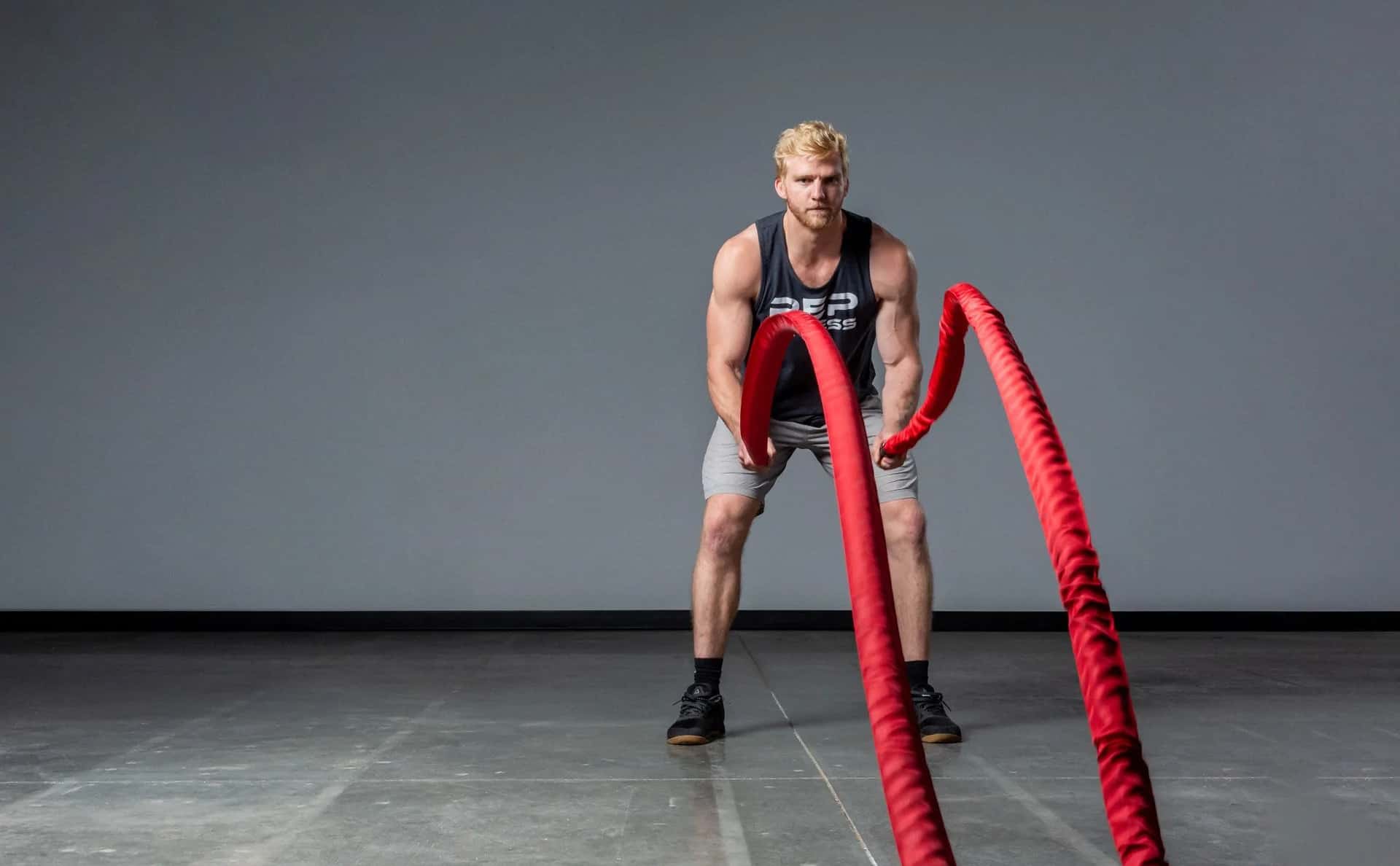 Rogue Fitness Sleeve Battle Rope with an athlete 5