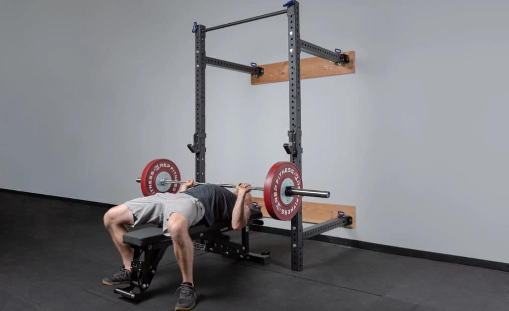 Rep Fitness PR-4100 Folding Squat Rack with an athlete 6