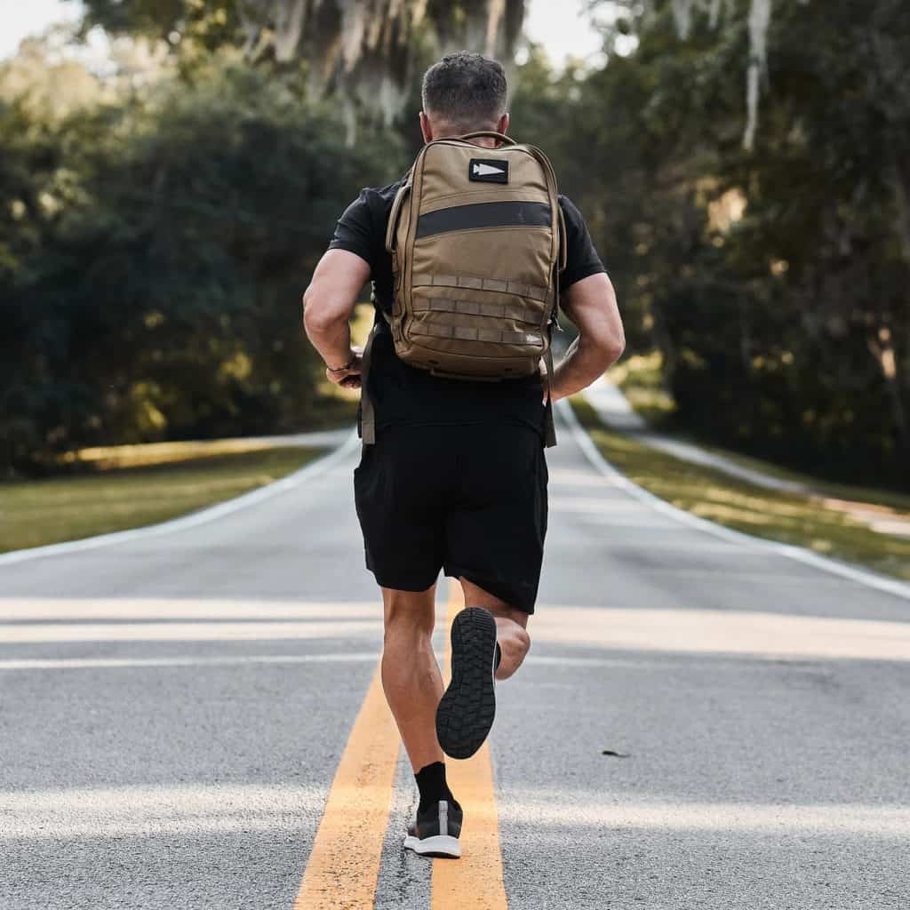 GORUCK Rough Runners - Black + Stone + White worn by an athlete 3