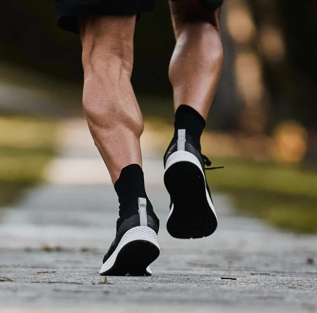 GORUCK Rough Runners - Black + Stone + White worn by an athlete 4