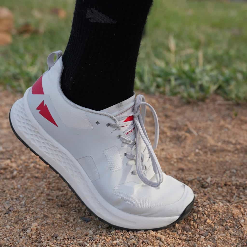 GORUCK Rough Runners - Light Grey + Red + White worn by an athlete 2