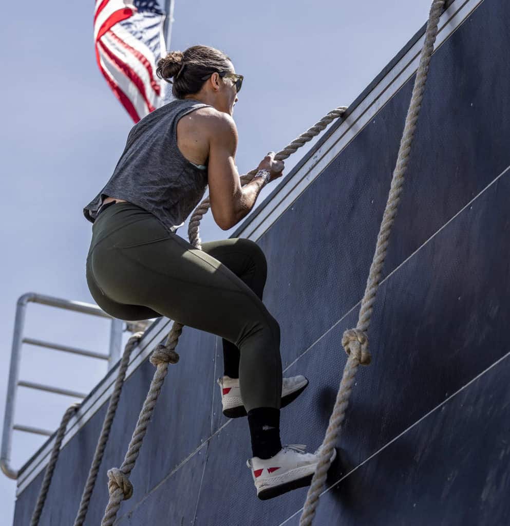 GORUCK Rough Runners - Light Grey + Red + White worn by an athlete 7